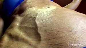 muscular babe flexes in tiny bikini thong