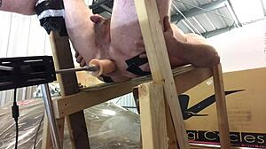 Old fat gay guy fucking with dildo machine on his back taking it deep