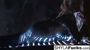 Blonde Shyla indulges in smoking fetish with big tits on display. Her solo act mesmerizes with every puff.