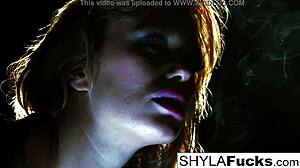 Blonde Shyla indulges in smoking fetish with big tits on display. Her solo act mesmerizes with every puff.
