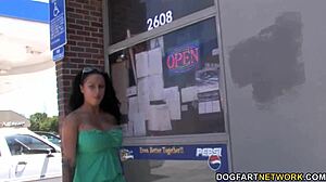 Hey, busty Kerry Louise is sucking that huge black cock at the gloryhole