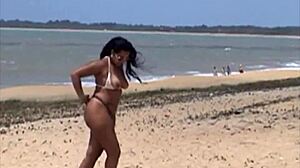 African brunette shows pussy on Porto Seguro beach