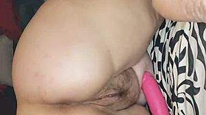 Woman Gapes Her Pussy Using Pink Dildo For Intense Sex.