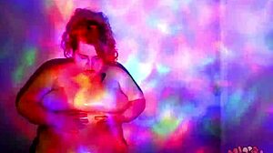 Plump redhead bbw goddess performs striptease dance while getting oiled naked