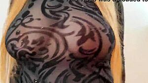 Wearing sweatshirt that shows huge boobs and nipples outdoors!