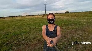 i juli smith meow undresses in the field, flashing nude pussy outdoors