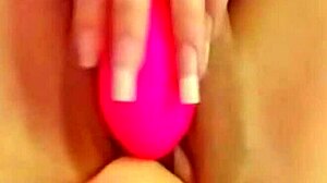 Excited redhead fists and squirts while banging her own pussy