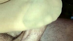 Homemade footjob using various nylons, stockings, leggings, and socks on toes and feet.