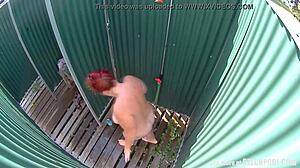 Busty mature lady spied in public shower 😍