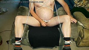 Edgar293 tied up in restrained masturbation with cumshot