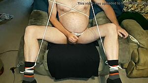 Edgar293 tied up in restrained masturbation with cumshot