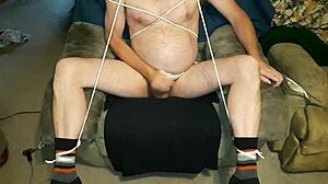 Edgar293 tied up in restrained masturbation with cumshot