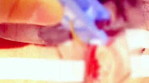 Sucking and pinching the clitoris during bondage massage with squirting orgasm