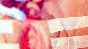 Sucking and pinching the clitoris during bondage massage with squirting orgasm