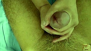 Mature wife gives relaxing handjob massage to husband's big cock
