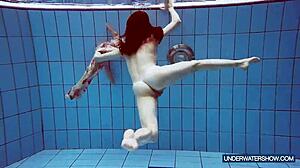 Martina, the hot Croatian teen, keeps steaming up the nudist beach. Her bikini shower show is pure fire!