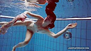 Martina, the hot Croatian teen, keeps steaming up the nudist beach. Her bikini shower show is pure fire!