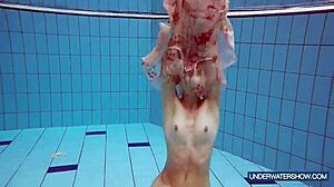 Martina, the hot Croatian teen, keeps steaming up the nudist beach. Her bikini shower show is pure fire!