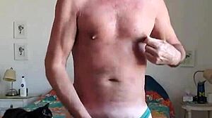 Pervy Papifachero Was Playing With His Big Daddy Boner Bulge In His Turquoise Thong And Just Rubbing His Frenum In The S