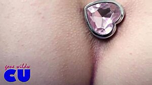 Crossdresser flaunts big ass in see-through outfit with butt plug. What a daring display!