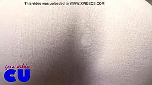 Crossdresser flaunts big ass in see-through outfit with butt plug. What a daring display!