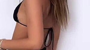 Why is Boutinela dancing in that black bikini at the club?