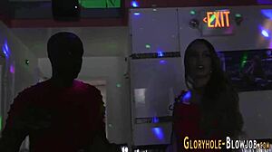 Young teen sucks big black cock through gloryhole for facial