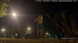Changing outfit in public park at night and flashing naked