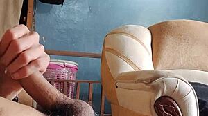 Dialogic-Provocative masturbating my cock in the living room