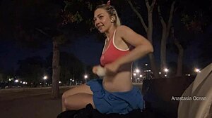 Changing outfit in public park at night and flashing naked