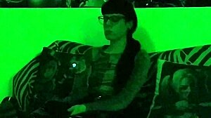 Beth Kinky, sexy goth domina, light up that cigarette in green glow!