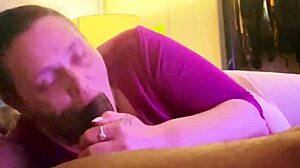 Chubby milf chokes on big black cock with intense mouth action