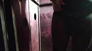 Whoa, this milf is sucking multiple big cocks through the gloryhole outdoors!