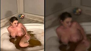 Passionate busty brunette Sophie Dee enjoys a steamy bath session