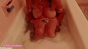 kitty hudson enjoys solo bath time with her pussy.