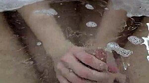 Bath Handjob Turns Into Steamy Underwater Cumshot With Sexy Couple