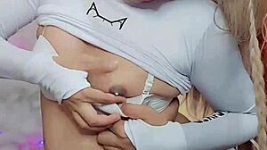 hey, wanna see this gorgeous white snow transsexual in action?