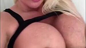 Sophie James, home alone, says 'I'm so horny with my big tits and shaved pussy'