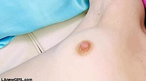 Red haired model displays her attractive figure during a photoshoot session in pov style.