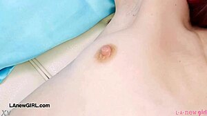 Red haired model displays her attractive figure during a photoshoot session in pov style.