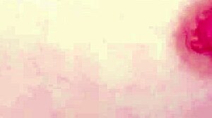 Red haired model displays her attractive figure during a photoshoot session in pov style.