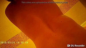 spy camera captures shower with nude tits in bathing scene