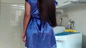 Housewife teases repairman fixing her washing machine