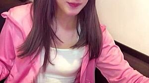 Cute Japanese crossdresser in netted outfit masturbates live on camera for fans