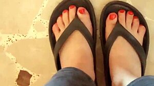 Greta applies nail polish to her toes