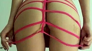 being a naughty slut in that bright pink dress with spanking