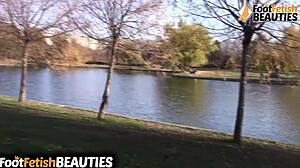 Brunette babe candidly removes socks to walk barefoot with exposed toes in public park