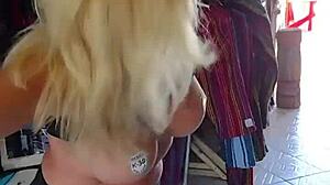 She's nude in public, enjoying the outdoor exposure