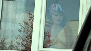 Taxi driver spots naked milf in stockings without panties washing apartment window