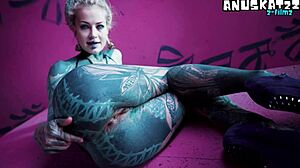 Goth slut stretches asshole with fisting